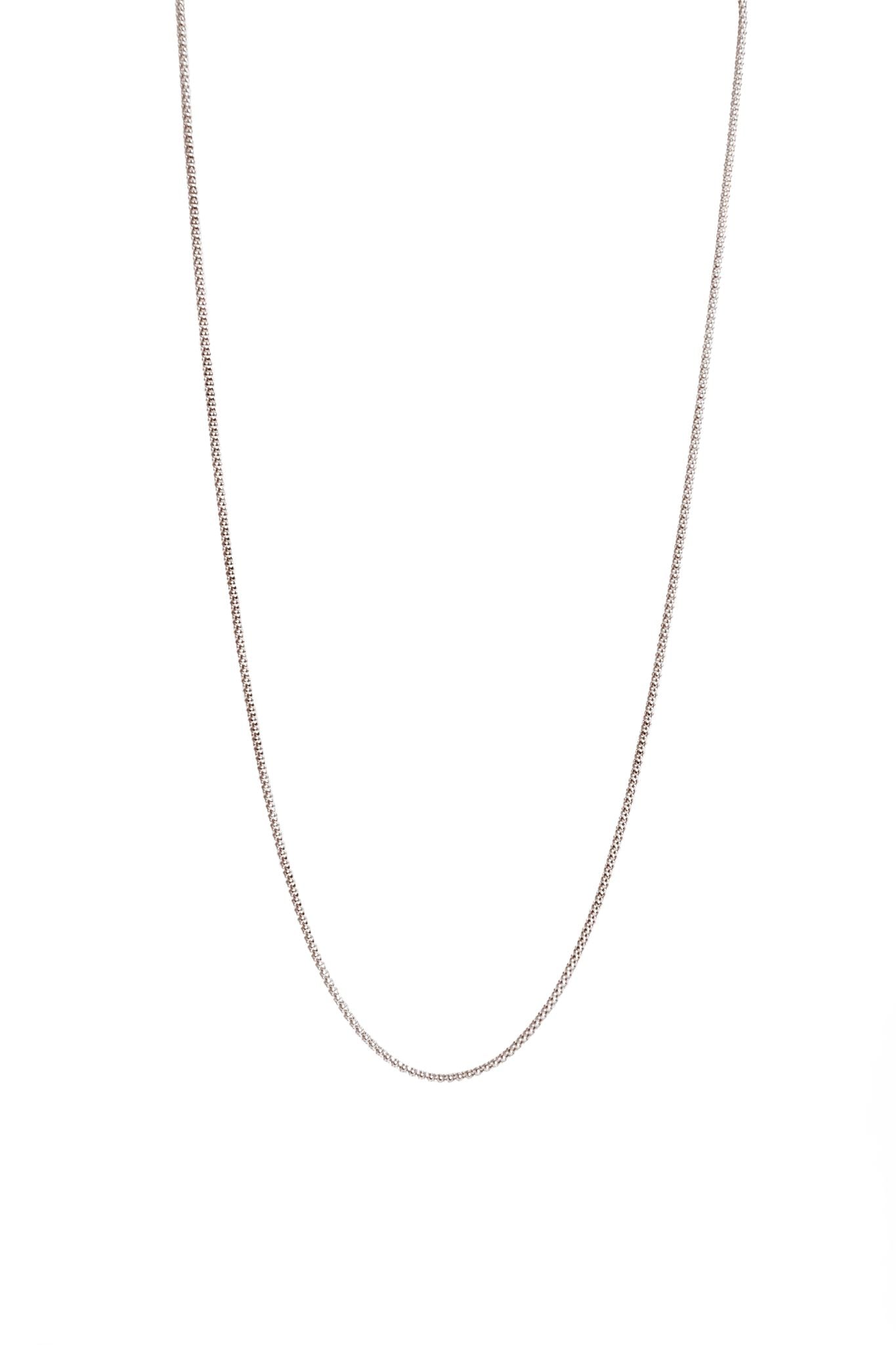 Cadena Scale Oro Blanco