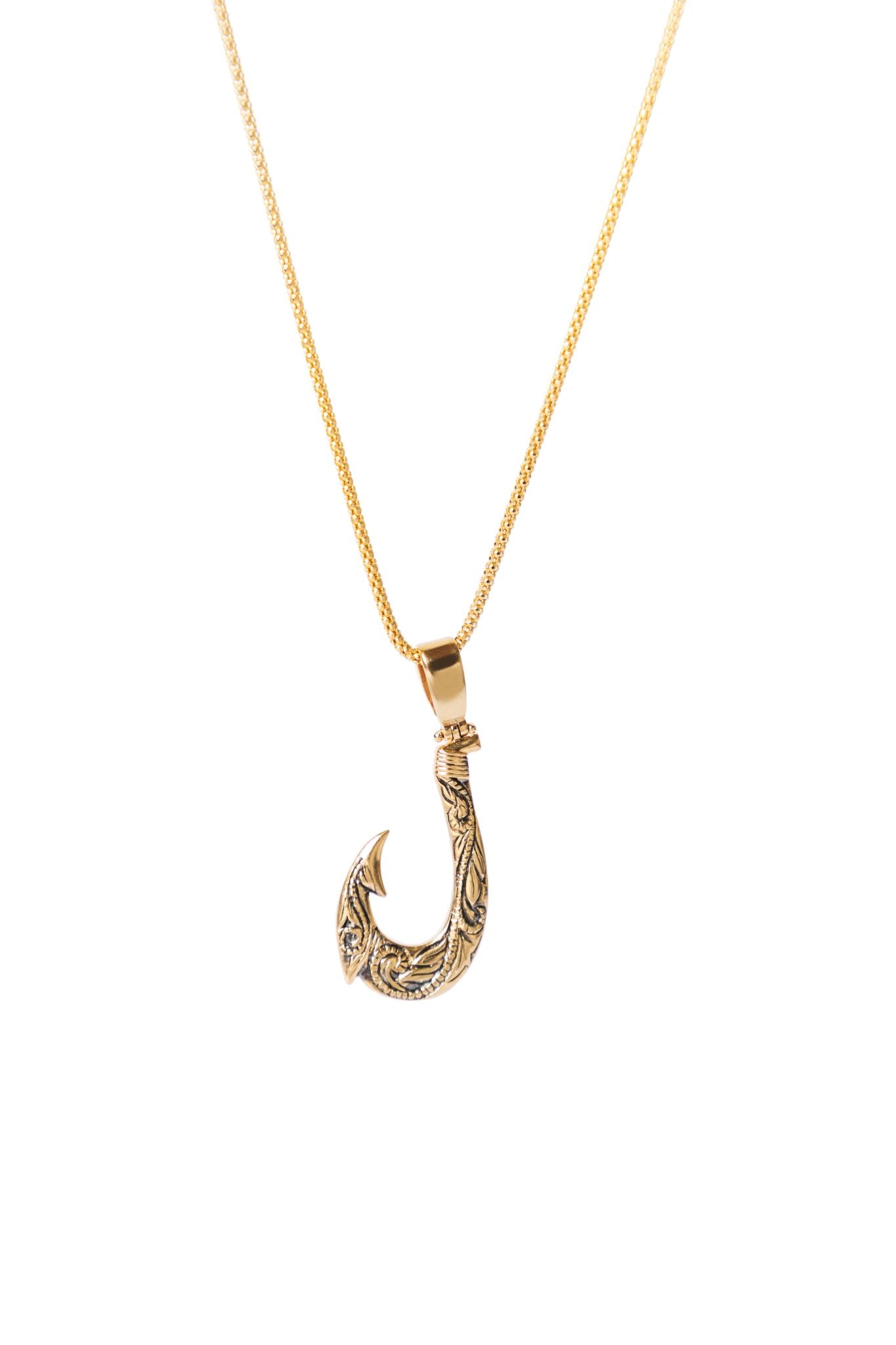 Dije Hawaiano Hook con Oro Negro